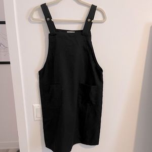 black overall dress